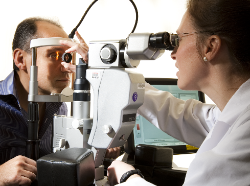 Eye doctor looks for leaking blood vessels